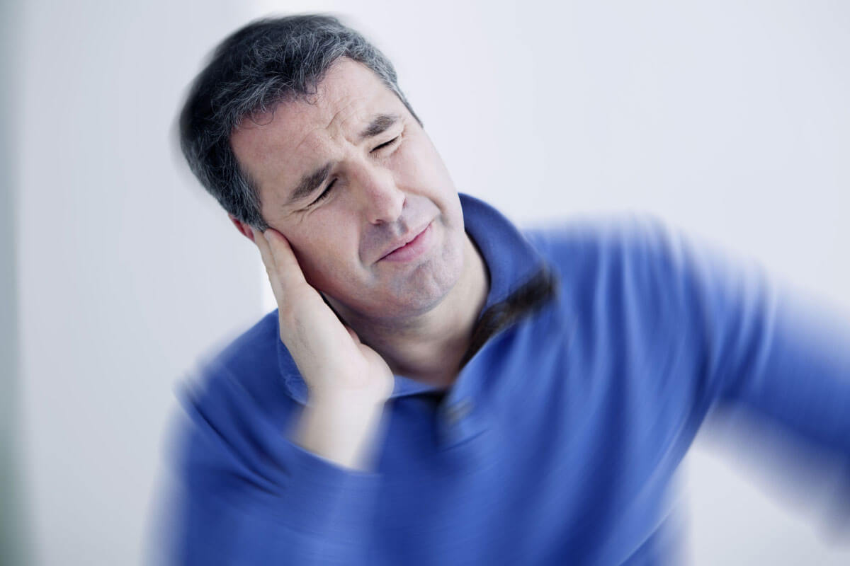 man suffering hyperacusis